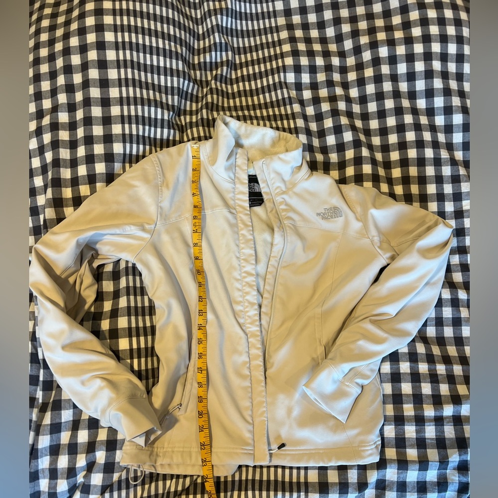 White soft shell north face jacket